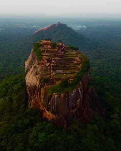 Sigiriya Rock Fortress
  Sigiriya, also known as Lion Rock, is an ancient rock fortress and UNESCO World Heritage Site. Rising 200 meters above the surrounding landscape, it features stunning frescoes, intricate gardens, and the ruins of a royal palace. Its historical significance and breathtaking views make...